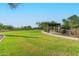 Sprawling community park features walking paths, picnic areas, and mature desert trees at 6965 E Hacienda La Noria Ln, Gold Canyon, AZ 85118