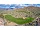 Aerial view of the beautiful golf course, set amidst the scenic desert and mountain views at 6965 E Hacienda La Noria Ln, Gold Canyon, AZ 85118