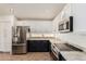 Spacious kitchen featuring stainless steel appliances, granite countertops, and ample cabinet space for storage at 6965 E Hacienda La Noria Ln, Gold Canyon, AZ 85118