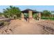 Community picnic area with covered seating and barbecue grills near the community pool at 6965 E Hacienda La Noria Ln, Gold Canyon, AZ 85118