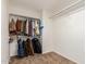 Spacious walk-in closet with ample hanging space and shelving for organization at 6965 E Hacienda La Noria Ln, Gold Canyon, AZ 85118