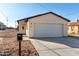 Charming single-story home featuring a two-car garage, desert landscaping and a modern design at 700 N D St, Eloy, AZ 85131
