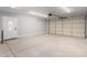 Clean garage with an updated door, side entry door, and ample space at 700 N D St, Eloy, AZ 85131