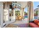 Relaxing covered patio includes a seating area and a view of the backyard swimming pool at 9 W Glenhaven Dr, Phoenix, AZ 85045