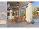 Inviting covered patio features an outdoor dining area, perfect for entertaining and relaxing at 9 W Glenhaven Dr, Phoenix, AZ 85045