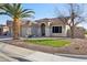 Charming single-story home featuring a well-manicured lawn, desert landscaping and a tile roof at 9 W Glenhaven Dr, Phoenix, AZ 85045