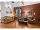 Inviting living room with cozy seating, wood floors, and unique decor at 9 W Glenhaven Dr, Phoenix, AZ 85045
