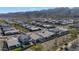 Aerial view of a new neighborhood surrounded by desert and mountains at 9422 S 7Th Pl, Phoenix, AZ 85042