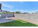 Spacious backyard featuring turf, gravel, and a block wall offering privacy at 9422 S 7Th Pl, Phoenix, AZ 85042
