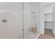 Bright bathroom featuring a glass shower with white subway tile and a built-in wooden bench at 9422 S 7Th Pl, Phoenix, AZ 85042