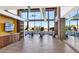Community fitness center with modern equipment and expansive windows overlooking desert landscape at 9422 S 7Th Pl, Phoenix, AZ 85042