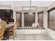 Charming breakfast nook with a bay window and custom seat cushions at 9809 W Wescott Dr, Peoria, AZ 85382