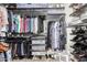 A closet with well-organized clothes, shoes, and shelving to maximize space at 9809 W Wescott Dr, Peoria, AZ 85382
