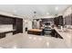 Open kitchen with a butcher block island, granite countertops, and stainless appliances at 9809 W Wescott Dr, Peoria, AZ 85382