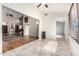 Open-concept living room featuring tile flooring and views to other living spaces at 9809 W Wescott Dr, Peoria, AZ 85382