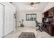 Office area with functional furniture and a ceiling fan at 9809 W Wescott Dr, Peoria, AZ 85382
