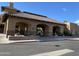 Exterior view of The Lakes Recreation Center with attractive stone accents and covered entryway at 9809 W Wescott Dr, Peoria, AZ 85382