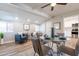 Elegant dining area with a glass table and inviting sitting space at 11214 N 105Th Ave, Sun City, AZ 85351