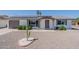 Attractive home featuring desert landscaping, and a cozy front porch at 11214 N 105Th Ave, Sun City, AZ 85351