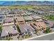 Overview of a residential neighborhood with mountain views in the distance at 11807 W Parkway Ln, Avondale, AZ 85323