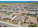 Residential area featuring multiple single-Gathering homes, with some homes having solar panels at 11807 W Parkway Ln, Avondale, AZ 85323