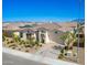 Beautiful single-story home with a two-car garage and desert landscaping at 11807 W Parkway Ln, Avondale, AZ 85323