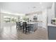 Bright kitchen boasts a large island with pendant lighting and opens to the living area at 11807 W Parkway Ln, Avondale, AZ 85323