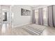 Well-lit room with wood-look tile flooring, neutral walls, and a striped accent rug at 11807 W Parkway Ln, Avondale, AZ 85323