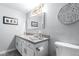 Well-lit bathroom with modern fixtures, a clean toilet, and stylish decor at 1211 N Miller Rd # 258, Scottsdale, AZ 85257