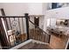 Grand foyer with ornate iron stair railing that leads to the second floor at 122 W Raven Dr, Chandler, AZ 85286