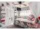 Bright, cheerful bedroom featuring a decorative bed, closet space, and cozy window at 12608 W Lower Buckeye Rd, Avondale, AZ 85323