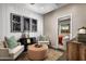 Stylish sitting area with decorative wall art, neutral decor, and an inviting ambiance at 12642 W Parkway Ln, Avondale, AZ 85323