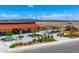 A high angle shot of the community area showcasing a playground, picnic tables, and landscaped gardens at 12651 W Parkway Ln, Avondale, AZ 85323