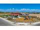 A sunny image of the community area, featuring a playground and a covered picnic area at 12651 W Parkway Ln, Avondale, AZ 85323