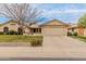 Charming single-story home featuring a well-maintained front yard, mature tree, and a spacious two-car garage at 13026 W Peach Blossom Dr, Sun City West, AZ 85375