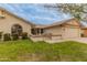 Charming single-story home featuring well-maintained landscaping and a welcoming front courtyard at 13026 W Peach Blossom Dr, Sun City West, AZ 85375