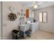 Functional laundry room equipped with a utility sink, washer, and dryer, providing convenience and efficiency at 13026 W Peach Blossom Dr, Sun City West, AZ 85375