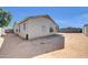 View of the back of the house and backyard featuring sand and block fences at 1316 E Spencer St, Casa Grande, AZ 85122