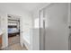 Bathroom featuring a shower stall, tub, and entrance into the main bedroom at 1316 E Spencer St, Casa Grande, AZ 85122