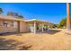 Backyard with covered patio and furniture with lawn at 13621 N Emberwood Dr, Sun City, AZ 85351