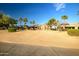 View of backyard with desert landscaping and view of the golf course at 15131 W Daybreak Dr, Surprise, AZ 85374