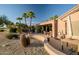 Backyard patio featuring a grill, desert landscaping, and a view at 15131 W Daybreak Dr, Surprise, AZ 85374