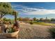 Scenic golf course view with desert landscaping and beautiful sky at 15131 W Daybreak Dr, Surprise, AZ 85374