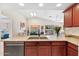 Kitchen area features sleek countertops, stainless steel appliances, and a convenient open layout at 17077 N Zuni Trl, Surprise, AZ 85374