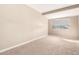 Cozy bedroom with neutral carpet and a window that provides natural light at 1736 E Coronado Rd, Phoenix, AZ 85006