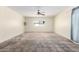 Bright living room with a ceiling fan and a window for natural light at 1736 E Coronado Rd, Phoenix, AZ 85006