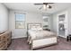 Serene bedroom featuring a comfortable bed, neutral decor, and plenty of natural light at 17496 W Summit Dr, Goodyear, AZ 85338