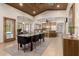 Open concept dining room with wood ceiling and views to the kitchen and sitting area at 1938 E Myrna Ln, Tempe, AZ 85284