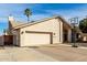 Charming single-story home featuring stucco facade, two car garage, and a basketball hoop in the driveway at 1938 E Myrna Ln, Tempe, AZ 85284