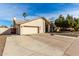 Charming single-story home with neutral stucco, two car garage, and a basketball hoop in the driveway at 1938 E Myrna Ln, Tempe, AZ 85284